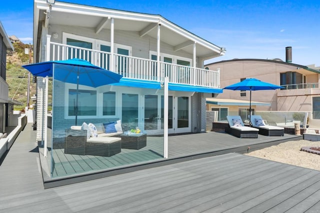 35321 Beach Rd, Dana Point, CA 92624 - back of property with a deck, french doors, a balcony, and an outdoor living space