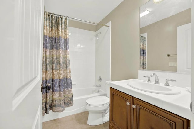 bathroom with tile patterned flooring, toilet, vanity, and shower / bath combo with shower curtain