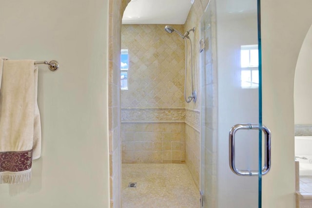 full bathroom with a shower stall