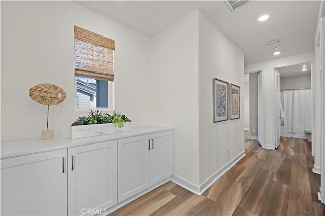 1730 Artemisia Ct, Carlsbad, CA 92011 - corridor featuring baseboards, recessed lighting, wood finished floors, and visible vents
