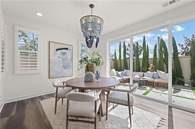 1730 Artemisia Ct, Carlsbad, CA 92011 - sunroom / solarium featuring visible vents and an inviting chandelier