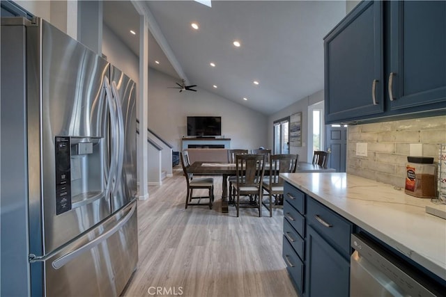2318 Cranesbill Pl, Avila Beach, CA 93424 - kitchen featuring appliances with stainless steel finishes, blue cabinetry, tasteful backsplash, light wood-style floors, and recessed lighting