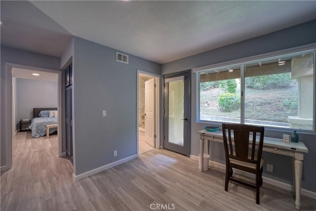 2318 Cranesbill Pl, Avila Beach, CA 93424 - unfurnished office with light wood-style flooring and a textured ceiling