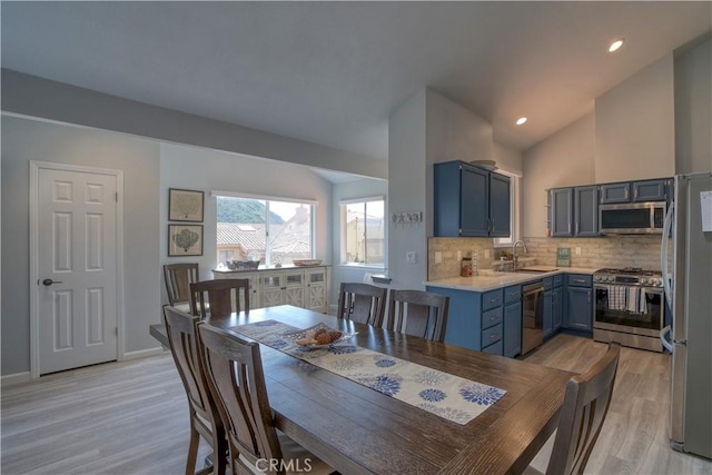 2318 Cranesbill Pl, Avila Beach, CA 93424 - dining area featuring lofted ceiling, light wood-style floors, and recessed lighting