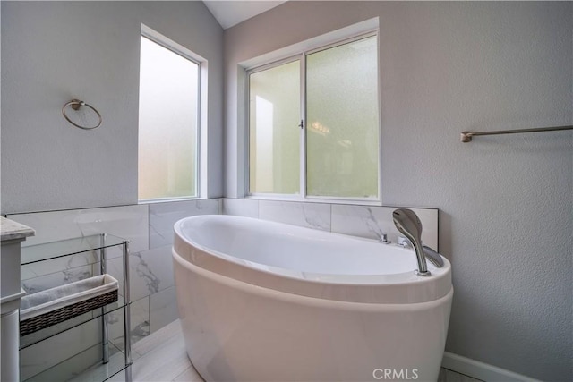 2318 Cranesbill Pl, Avila Beach, CA 93424 - bathroom featuring a bath and tile walls