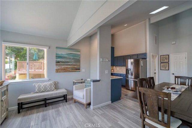 2318 Cranesbill Pl, Avila Beach, CA 93424 - dining room featuring high vaulted ceiling and light wood-style floors