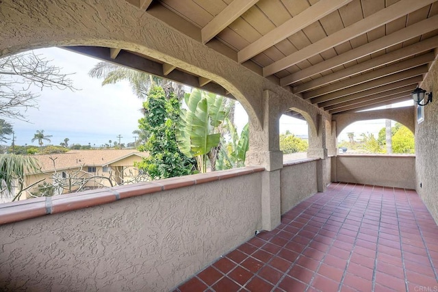 view of patio / terrace with a balcony