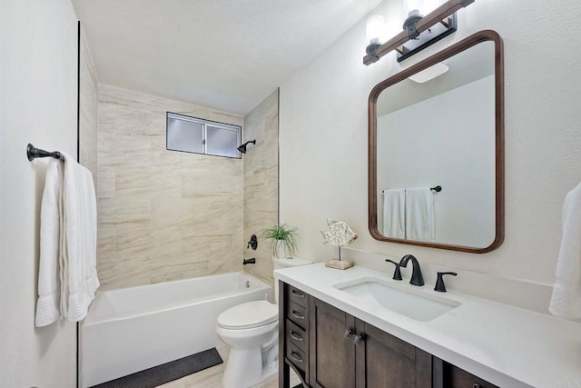 bathroom with toilet, vanity, and shower / washtub combination