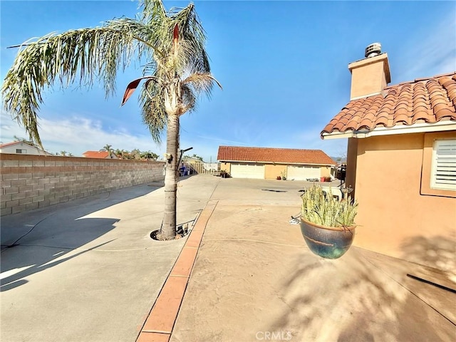 view of patio / terrace with fence
