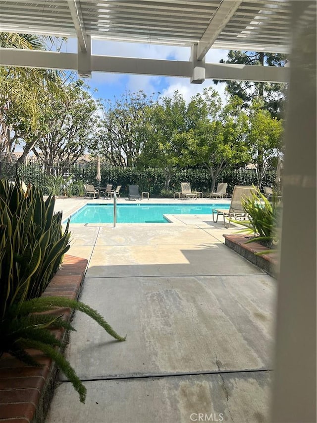1 Brandy Ln Unit 23, Aliso Viejo, CA 92656 - community pool with a patio area and a fenced backyard