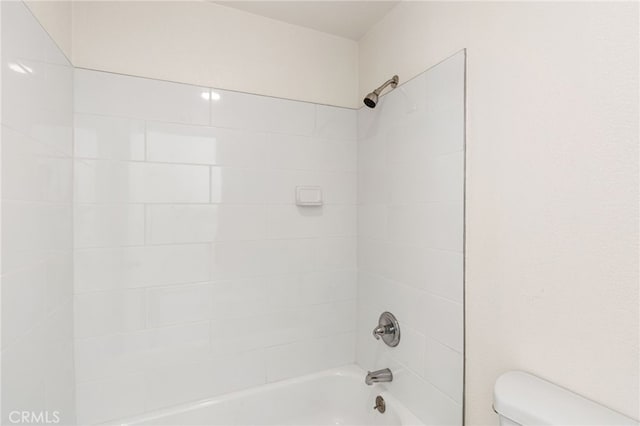 full bathroom with toilet and tub / shower combination