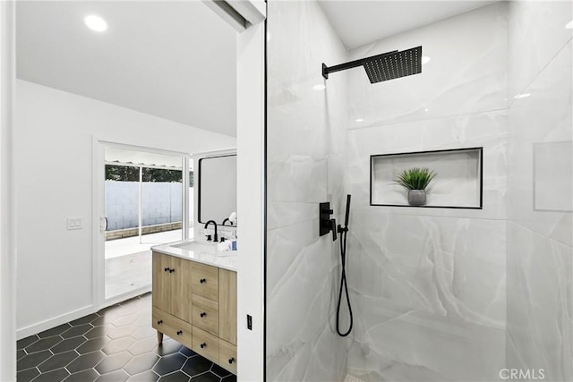 13538 Darvalle St, Cerritos, CA 90703 - bathroom featuring tile patterned floors, a marble finish shower, vanity, baseboards, and recessed lighting