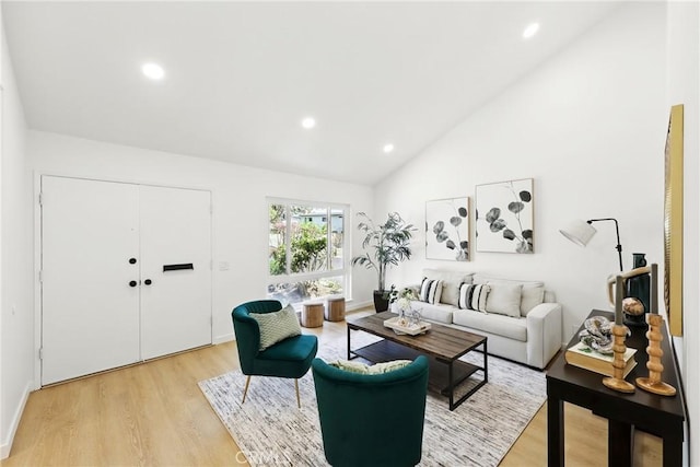 13538 Darvalle St, Cerritos, CA 90703 - living room with light wood finished floors, recessed lighting, and high vaulted ceiling