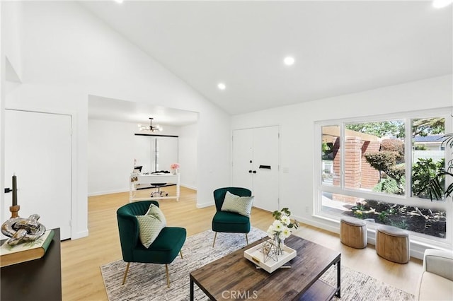13538 Darvalle St, Cerritos, CA 90703 - living area with high vaulted ceiling, an inviting chandelier, light wood-style flooring, baseboards, and recessed lighting