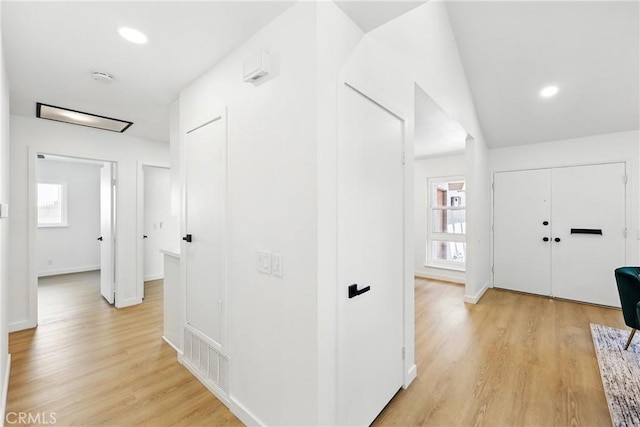 13538 Darvalle St, Cerritos, CA 90703 - hallway featuring light wood finished floors, baseboards, visible vents, and recessed lighting