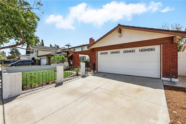 13538 Darvalle St, Cerritos, CA 90703 - view of front facade featuring fence, an attached garage, driveway, and brick siding