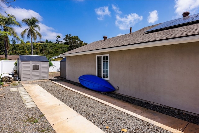 28861 Aloma Ave, Laguna Niguel, CA 92677 - exterior space with an outdoor structure, fence, and a storage unit