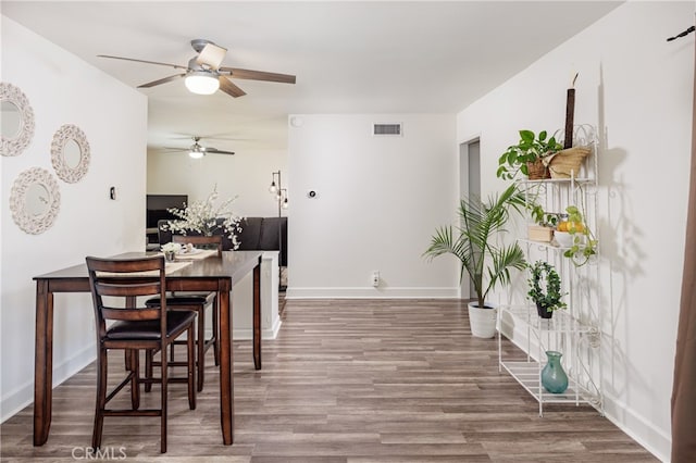 28861 Aloma Ave, Laguna Niguel, CA 92677 - dining area featuring visible vents, baseboards, a ceiling fan, and wood finished floors