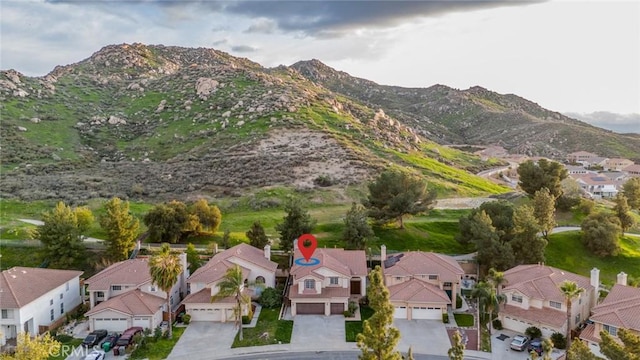bird's eye view with a residential view and a mountain view