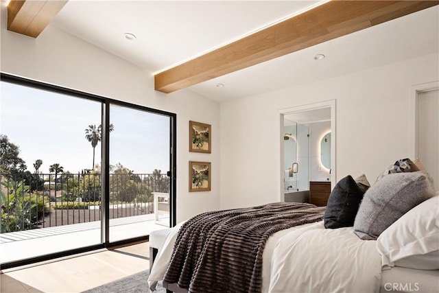 bedroom featuring multiple windows, access to exterior, beamed ceiling, and ensuite bathroom