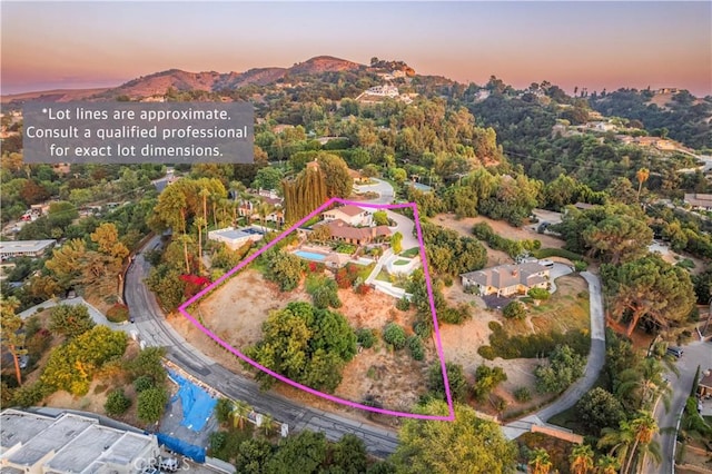 2333 N Coronet Ct, Covina, CA 91724 - aerial overview of property's location featuring property parcel outlined and a mountainous background