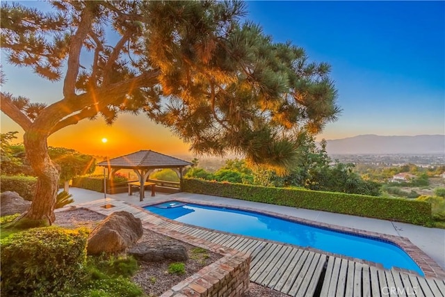 2333 N Coronet Ct, Covina, CA 91724 - view of pool with a gazebo, a mountain view, and a patio area