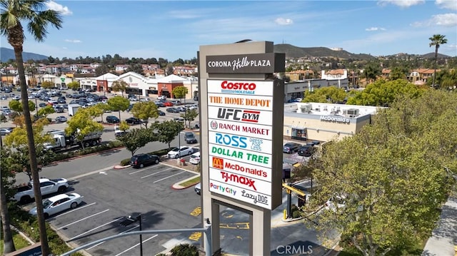 exterior details featuring parking and a mountain view