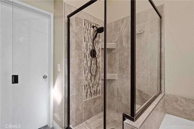 full bathroom with a stall shower