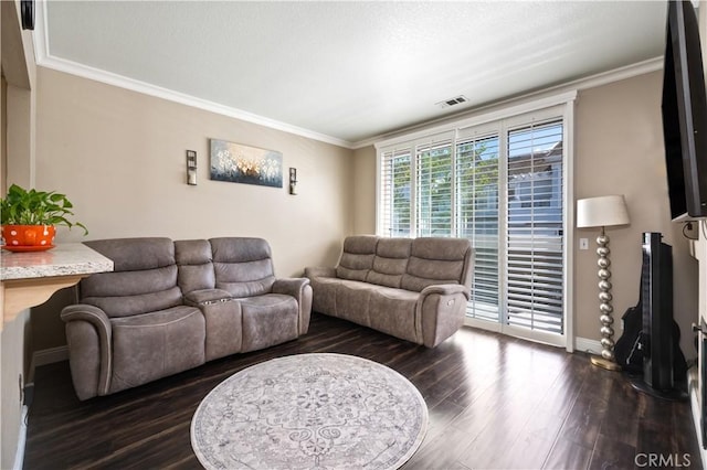 living room with baseboards, visible vents, ornamental molding, and dark wood finished floors