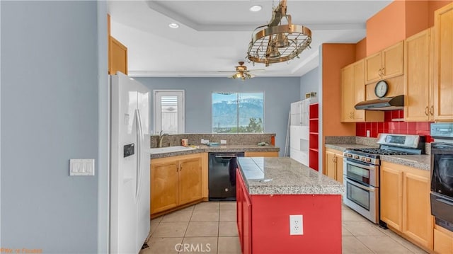 kitchen featuring white refrigerator with ice dispenser, a kitchen island, under cabinet range hood, dishwasher, and range with two ovens