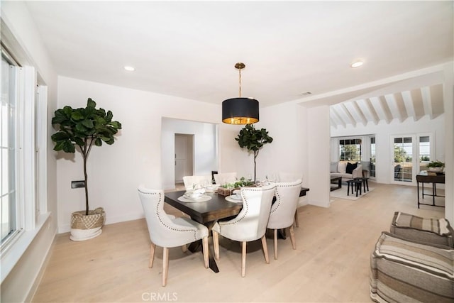 dining room featuring baseboards, visible vents, recessed lighting, and light wood-style floors