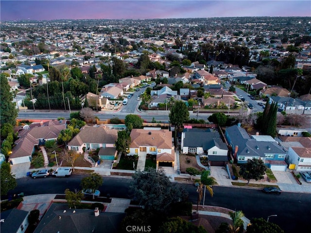 aerial view at dusk with a residential view