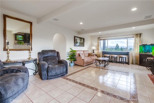 10549 Queen Ave, La Mesa, CA 91941 - living room featuring recessed lighting, arched walkways, light tile patterned floors, and visible vents