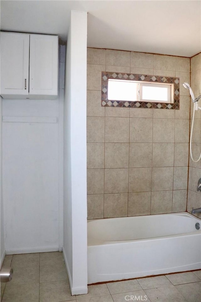 16226 Pine St, Hesperia, CA 92345 - bathroom featuring tile patterned floors, shower / bathing tub combination, and baseboards