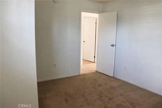 16226 Pine St, Hesperia, CA 92345 - carpeted empty room with baseboards