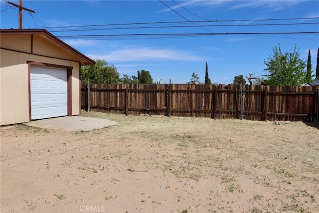 16226 Pine St, Hesperia, CA 92345 - view of yard with fence and an outdoor structure