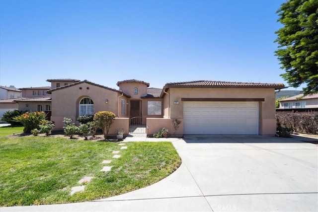 391 Camino Carta, San Marcos, CA 92078 - mediterranean / spanish house featuring a tiled roof, a garage, stucco siding, a gate, and driveway