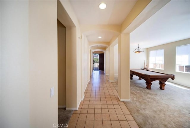 391 Camino Carta, San Marcos, CA 92078 - hall with recessed lighting, arched walkways, light tile patterned floors, and a healthy amount of sunlight