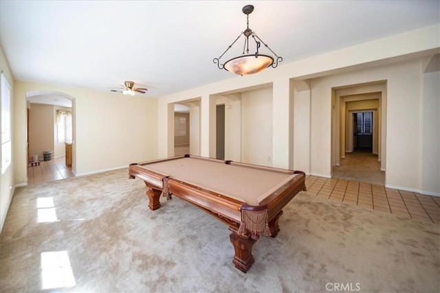 391 Camino Carta, San Marcos, CA 92078 - recreation room featuring arched walkways, carpet, a ceiling fan, and tile patterned flooring
