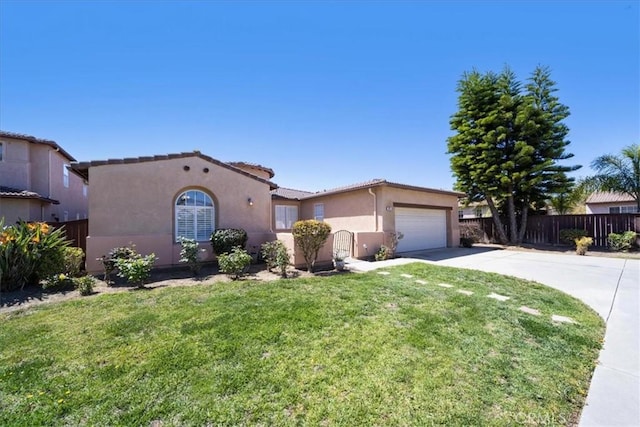 391 Camino Carta, San Marcos, CA 92078 - mediterranean / spanish-style house featuring an attached garage, fence, stucco siding, a front lawn, and driveway