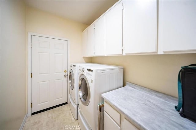 391 Camino Carta, San Marcos, CA 92078 - laundry area featuring washing machine and dryer, baseboards, and cabinet space