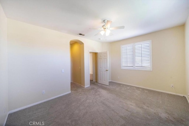 391 Camino Carta, San Marcos, CA 92078 - carpeted empty room featuring arched walkways, baseboards, a ceiling fan, and visible vents