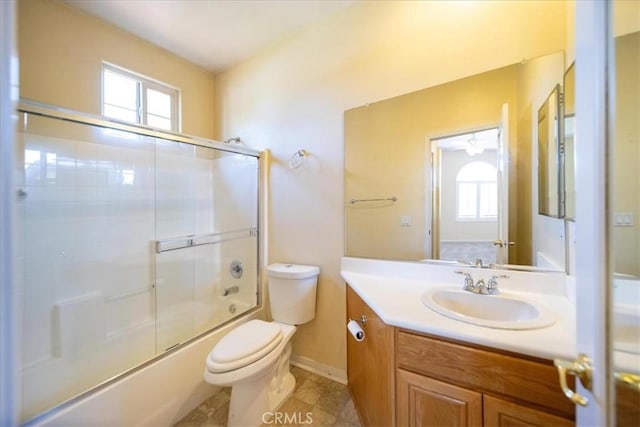 391 Camino Carta, San Marcos, CA 92078 - full bathroom with vanity, baseboards, tile patterned flooring, toilet, and bath / shower combo with glass door