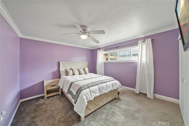 carpeted bedroom featuring crown molding, baseboards, and a ceiling fan