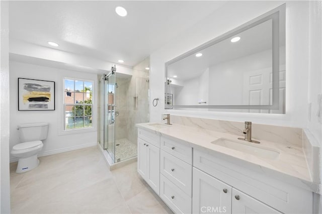 bathroom featuring recessed lighting, a sink, double vanity, and a shower stall
