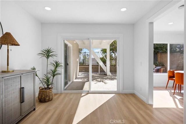 24812 Elena Dr, Laguna Hills, CA 92653 - doorway featuring light wood-style floors, recessed lighting, and baseboards