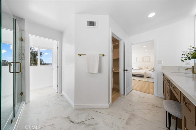 bathroom with baseboards, visible vents, a shower stall, and marble finish floor