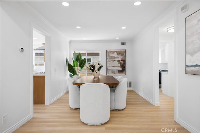 24812 Elena Dr, Laguna Hills, CA 92653 - dining area featuring light wood-style floors, baseboards, ornamental molding, and recessed lighting