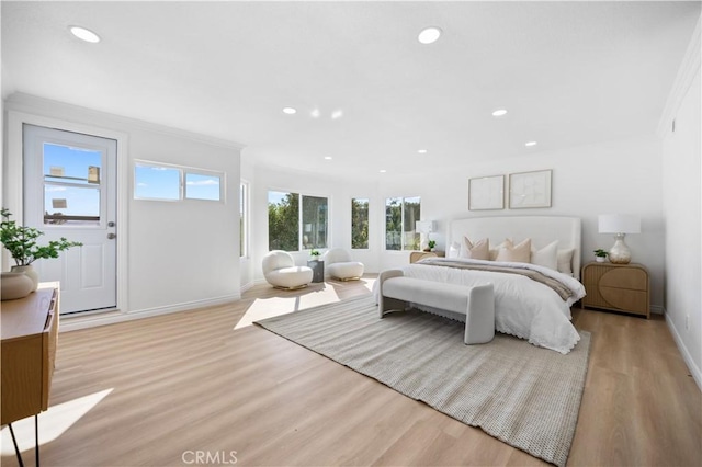 bedroom with recessed lighting, baseboards, and light wood finished floors