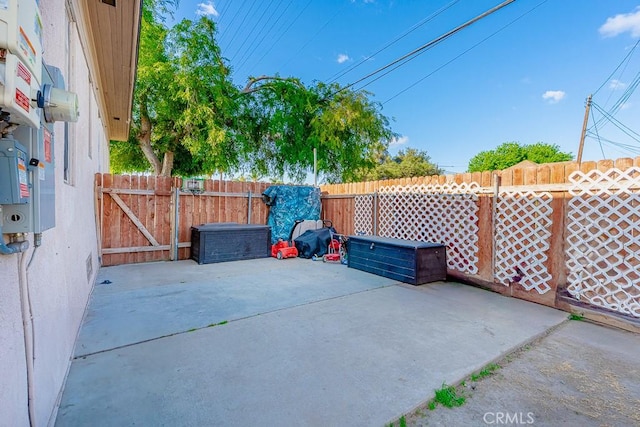 view of patio / terrace with a gate and fence